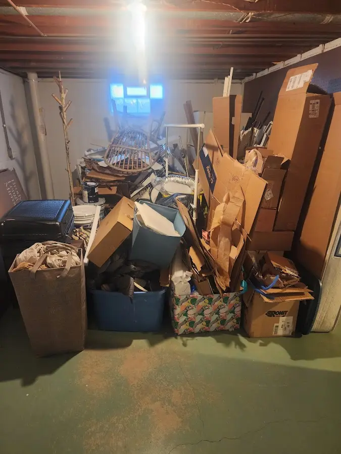 Roll-off dumpster container at job site for Yard Waste Dumpster Rental in Bar Nunn